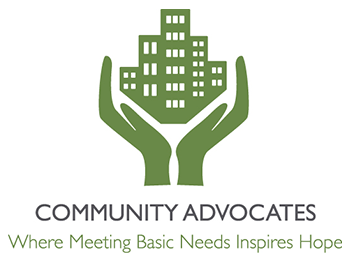 Logo for Community Advocates in an olive green color that depicts two hands holding up a city skyline. The tagline reads "Where Meeting Basic Needs Inspires Hope"