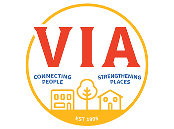 Yellow circular logo with linear icons near the bottom of the circle indicating a building, a tree, and a house. At the top of the circle is the acronym "VIA" in red letters, and underneath it on either side of the circle are blue words that say "Connecting People" and "Strengthening Places"